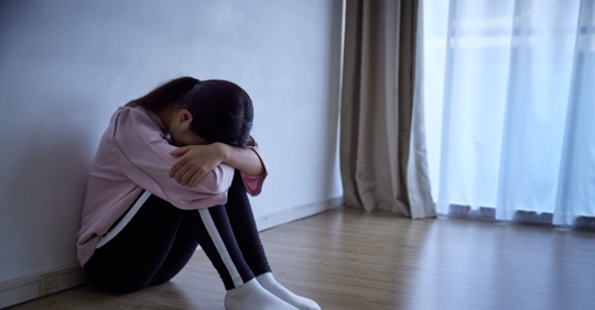 A girl sobbing quietly